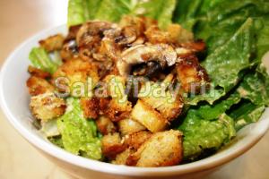 Caesar salad with chicken and mushrooms